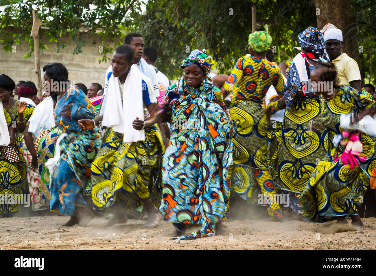 Men and women dancing during Zangbeto voodoo ceremony. Benin, Africa, February 2011. Stock Photo
