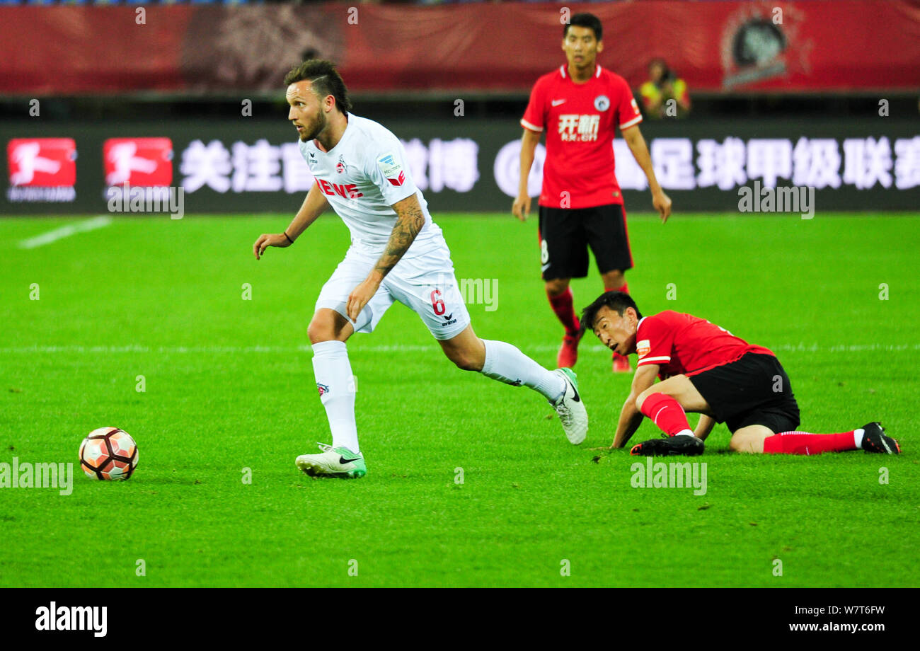 German Football Player Marco Hoger Left Of Fc Koln Challenges A Football Player Of Liaoning Whowin During The 2017 Sino German International Fride Stock Photo Alamy