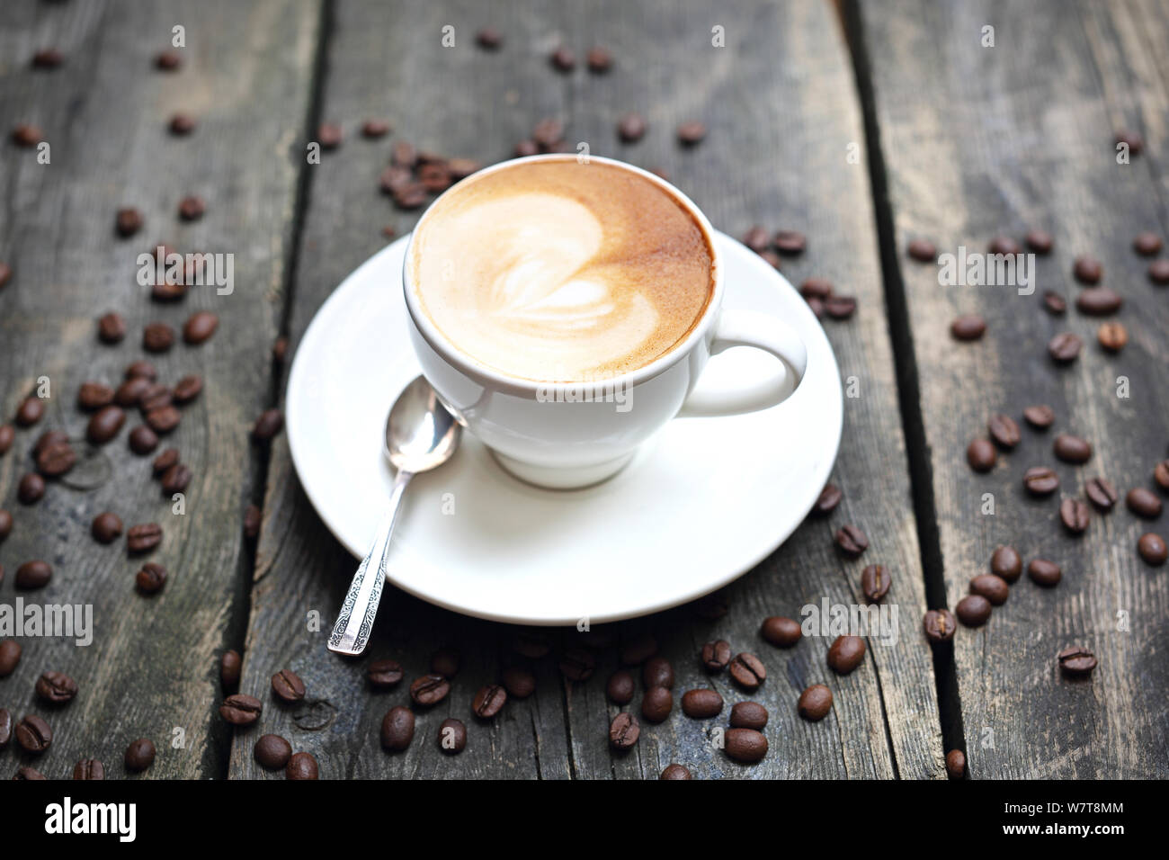 Coffee in a cup on a wooden background Stock Photo