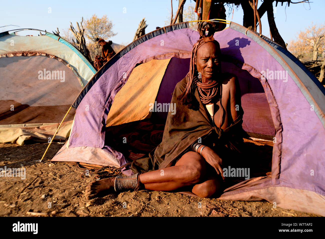 Camping tents used for sleeping inside a Himba village. Kaokoland, Namibia, September 2013. Stock Photo