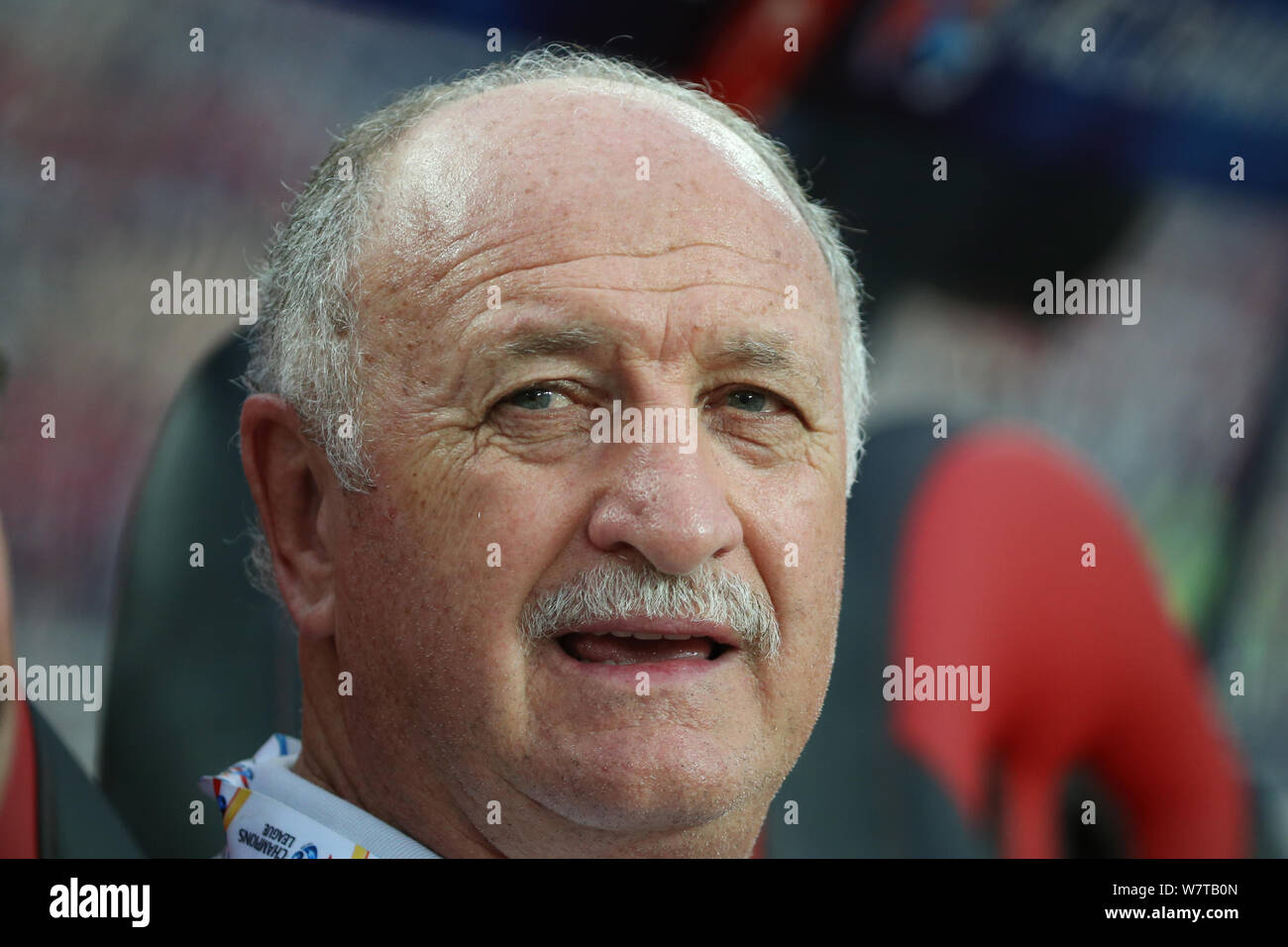 Head coach Luiz Felipe Scolari of China's Guangzhou Evergrande F.C. watches his players competing against South Korea's Suwon Samsung Bluewings in a G Stock Photo