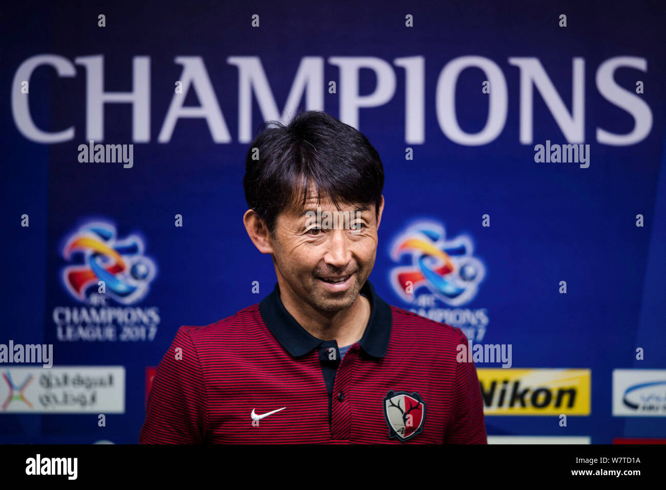 Head coach Masatada Ishii of Japan's Kashima Antlers attends a press  conference ahead of the Round of 16 match against China's Guangzhou  Evergrande du Stock Photo - Alamy