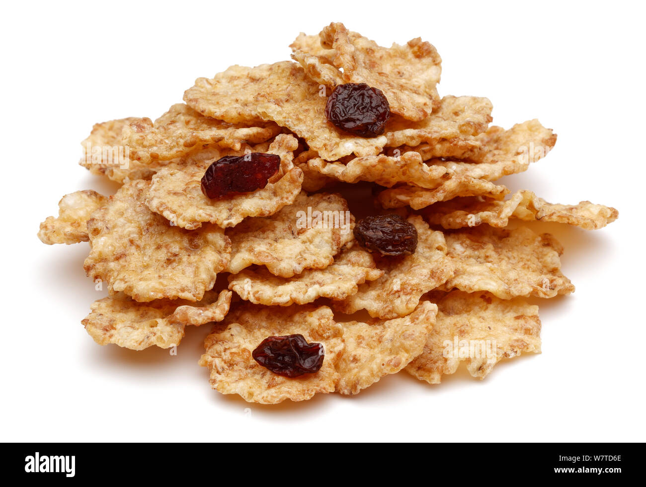 Heap of cereal with raisins isolated on white background Stock Photo