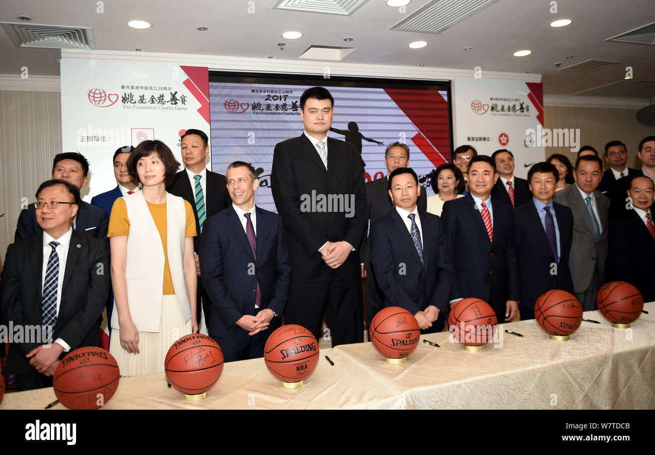Retired Chinese basketball star Yao Ming, center, chairman of the Chinese Basketball Association (CBA), is pictured during a press conference for the Stock Photo