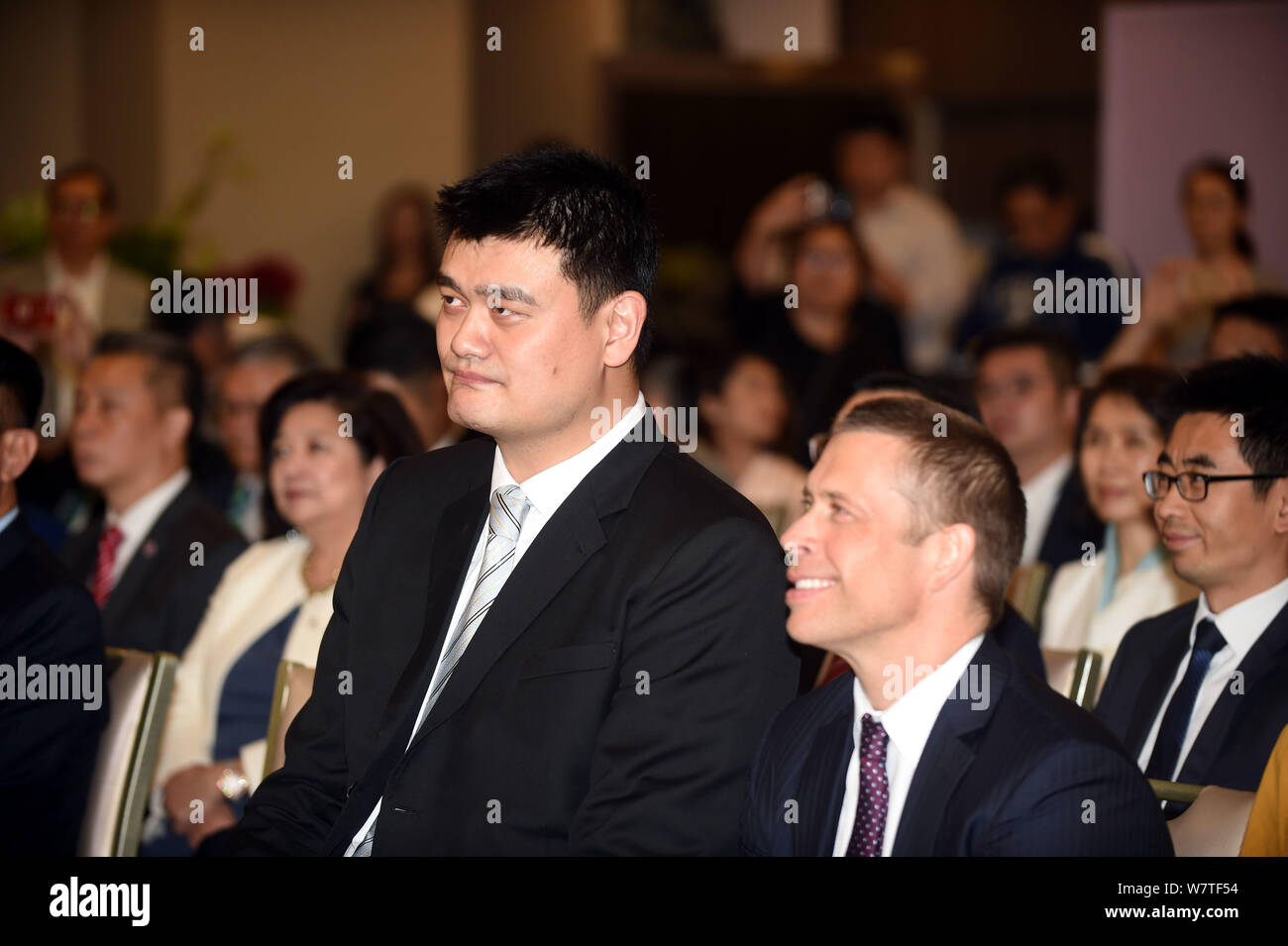 Retired Chinese basketball star Yao Ming, left, chairman of the Chinese Basketball Association (CBA), is pictured during a press conference for the an Stock Photo