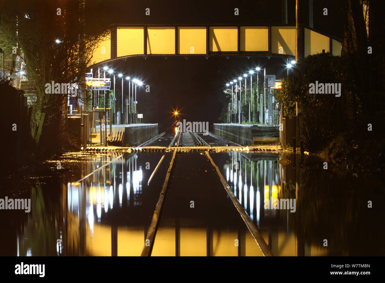 Flooded Datchet railway station at night, Berkshire, England, UK, 11th February 2014. Stock Photo