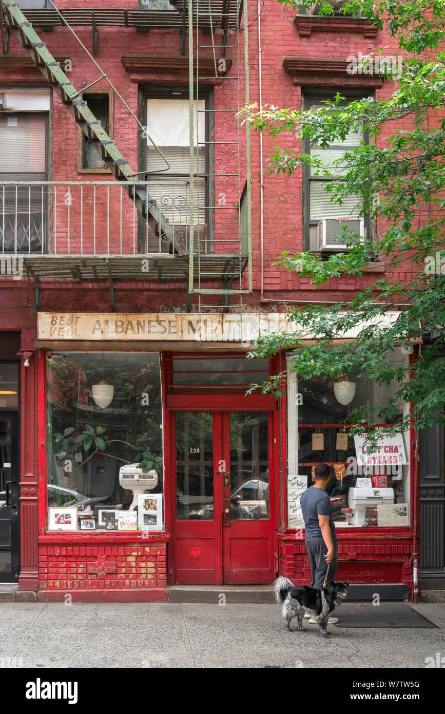 Elizabeth Street Nolita NYC, view of a man looking into a traditional