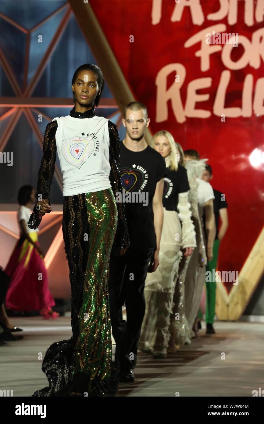 MILAN, ITALY - JANUARY 13, 2019: Woman with Louis Vuitton gray jacket with  logo relief before Reshake fashion show, Milan Fashion Week street style  Stock Photo - Alamy