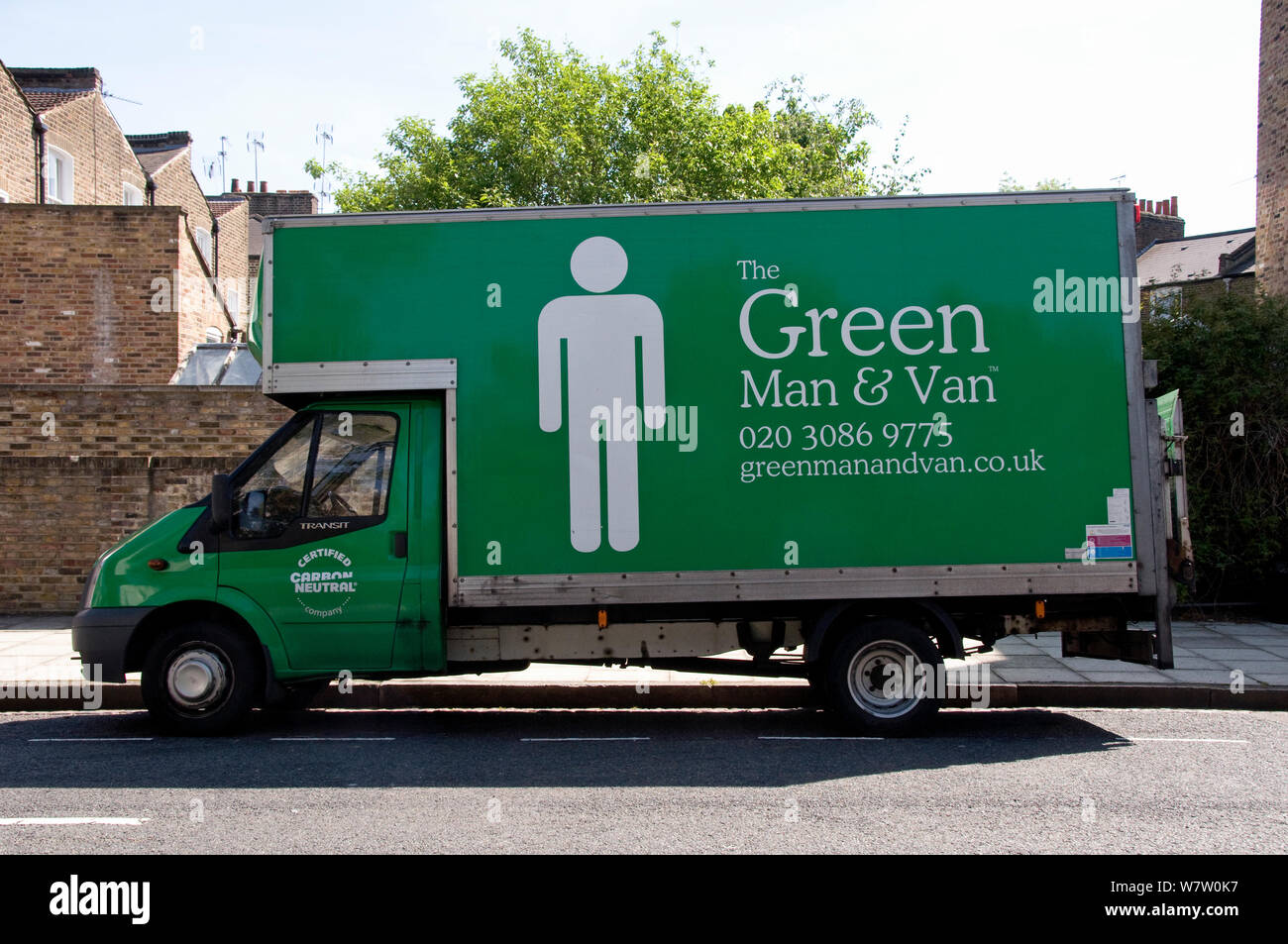 The Green Man and Van printed on side of green coloured van with Carbon