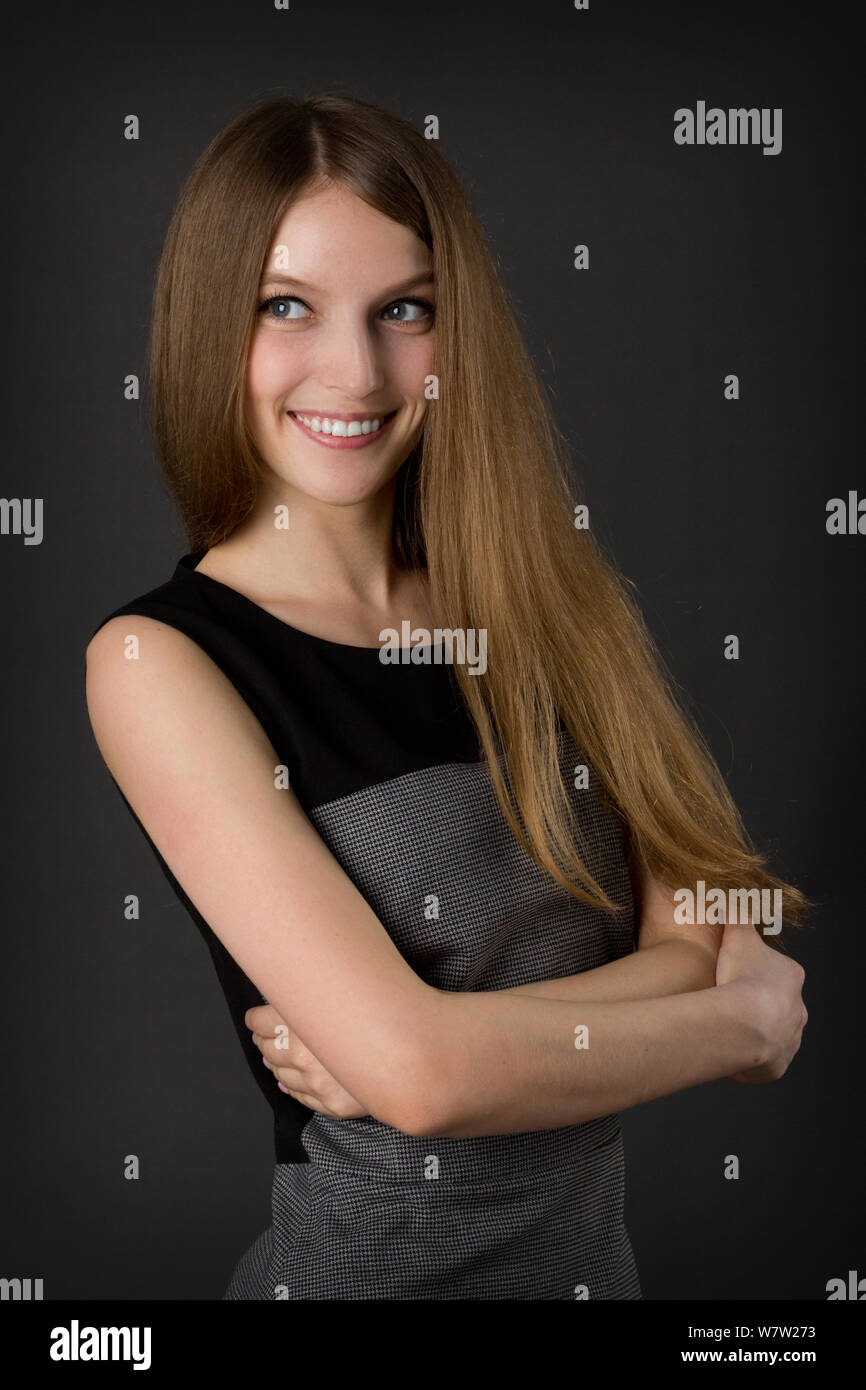 portrait of a young beautiful smiling girl, studio picture Stock Photo ...