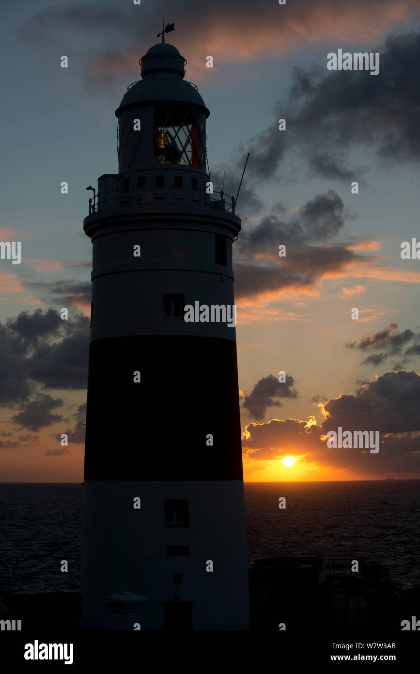Europa Point Lighthouse at dawn, looking east into the Mediterranean Sea, Gibraltar, December. Stock Photo
