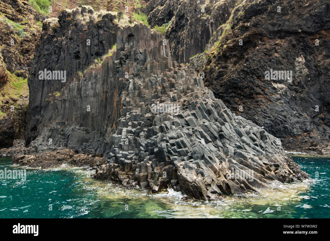 Volcanic cliffs, south of Santa Maria island, Azores, Portugal, July 2012. Stock Photo