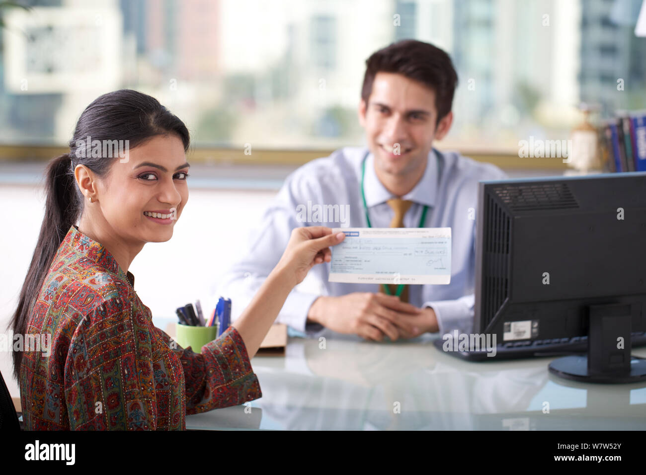 Finance executive cheque hi-res stock photography and images - Alamy