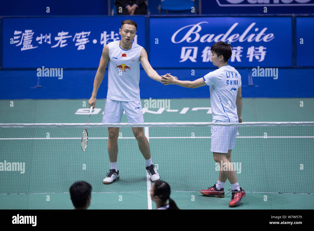 Li Yinhui, right, and Zhang Nan, left, of China celebrate after scoring