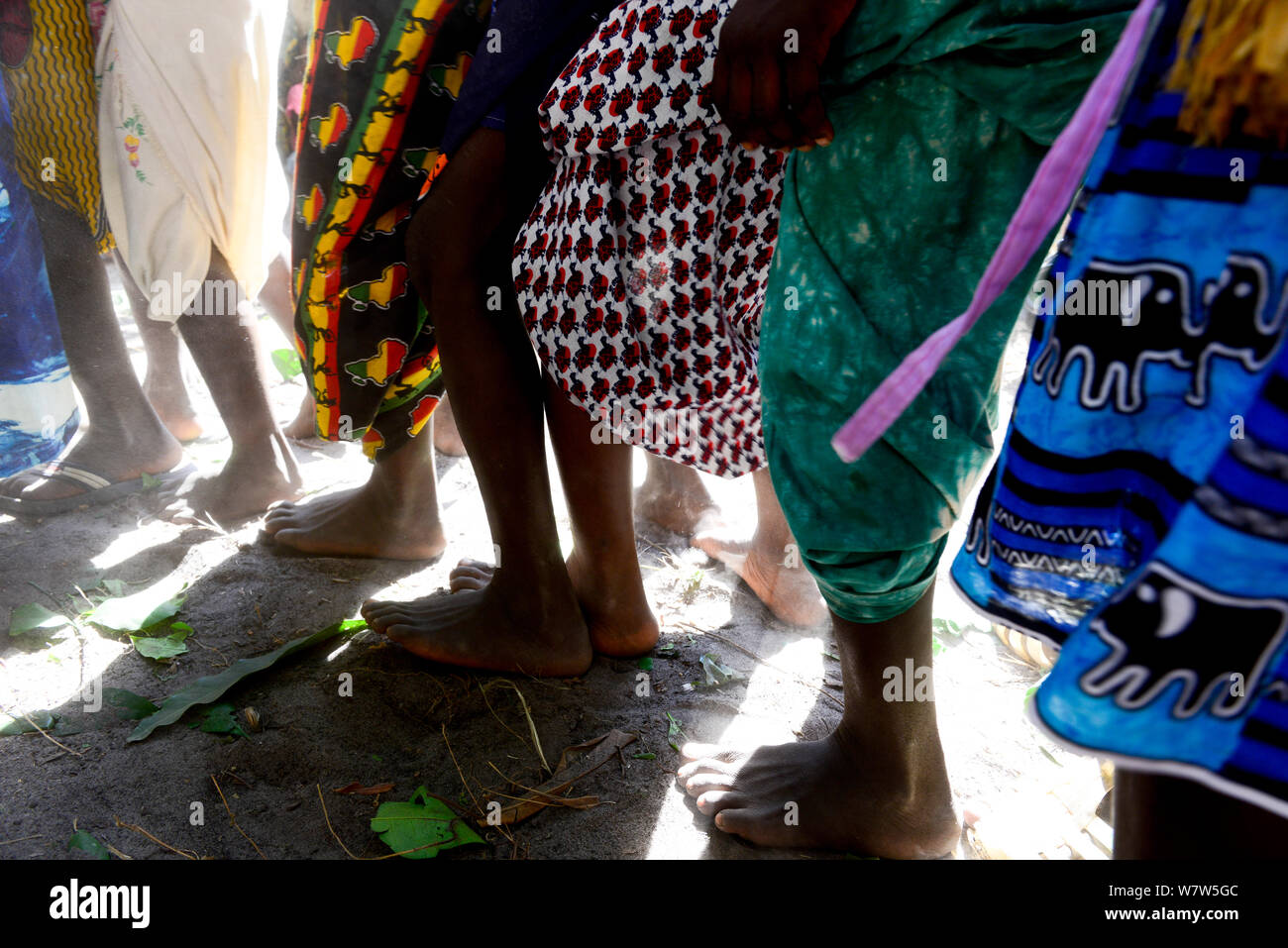 Feet of people dancing at wedding in the village of Ambeduco. Orango Island, Guinea-Bissau, December 2013 Stock Photo