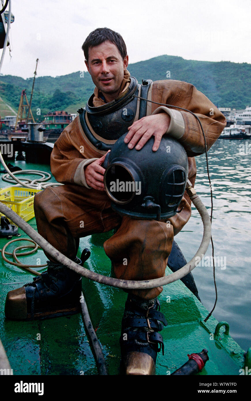 Michael Pitts , underwater cameraman, in standard divers dress with