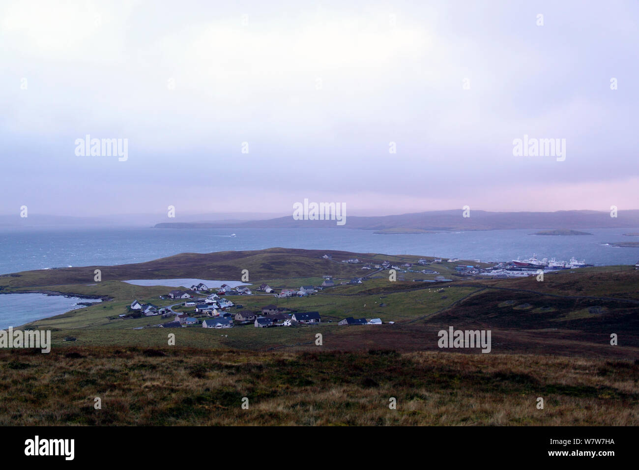 View of Symbister Harbour, Whalsay, Shetland Islands, November 2013. Stock Photo