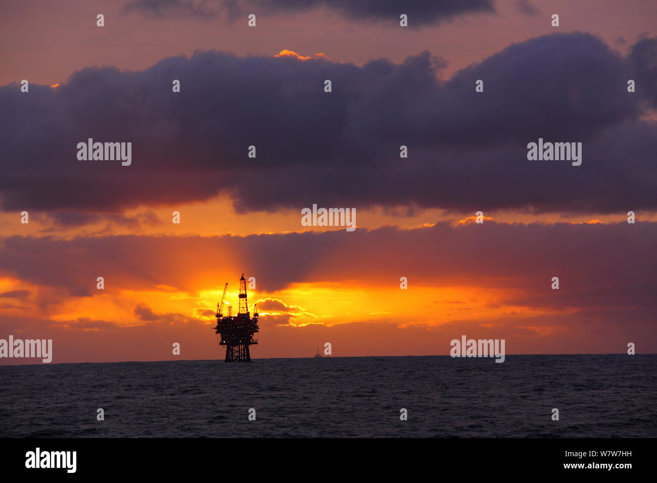 Sunrise at the Eider platform, 60 miles northeast of Shetland, North Sea, November 2013. All non-editorial uses must be cleared individually. Stock Photo
