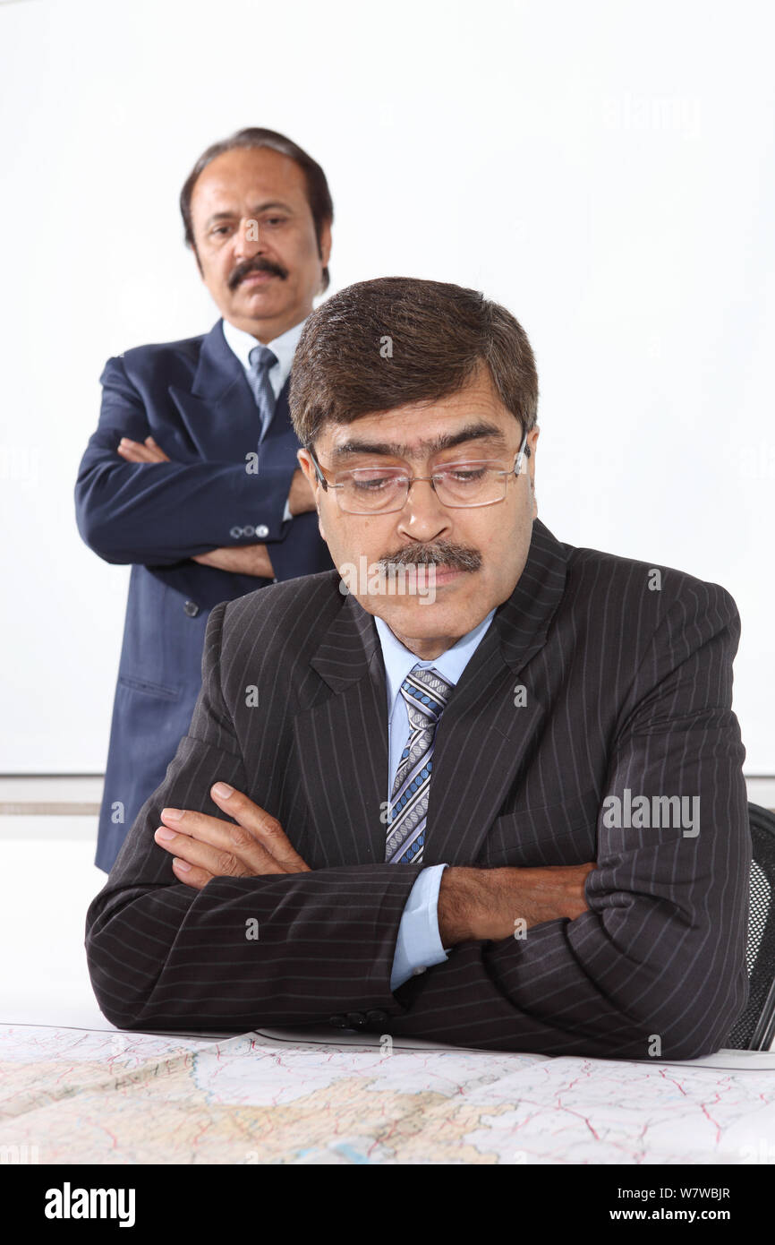 Businessman Looking In Map Stock Photo Alamy