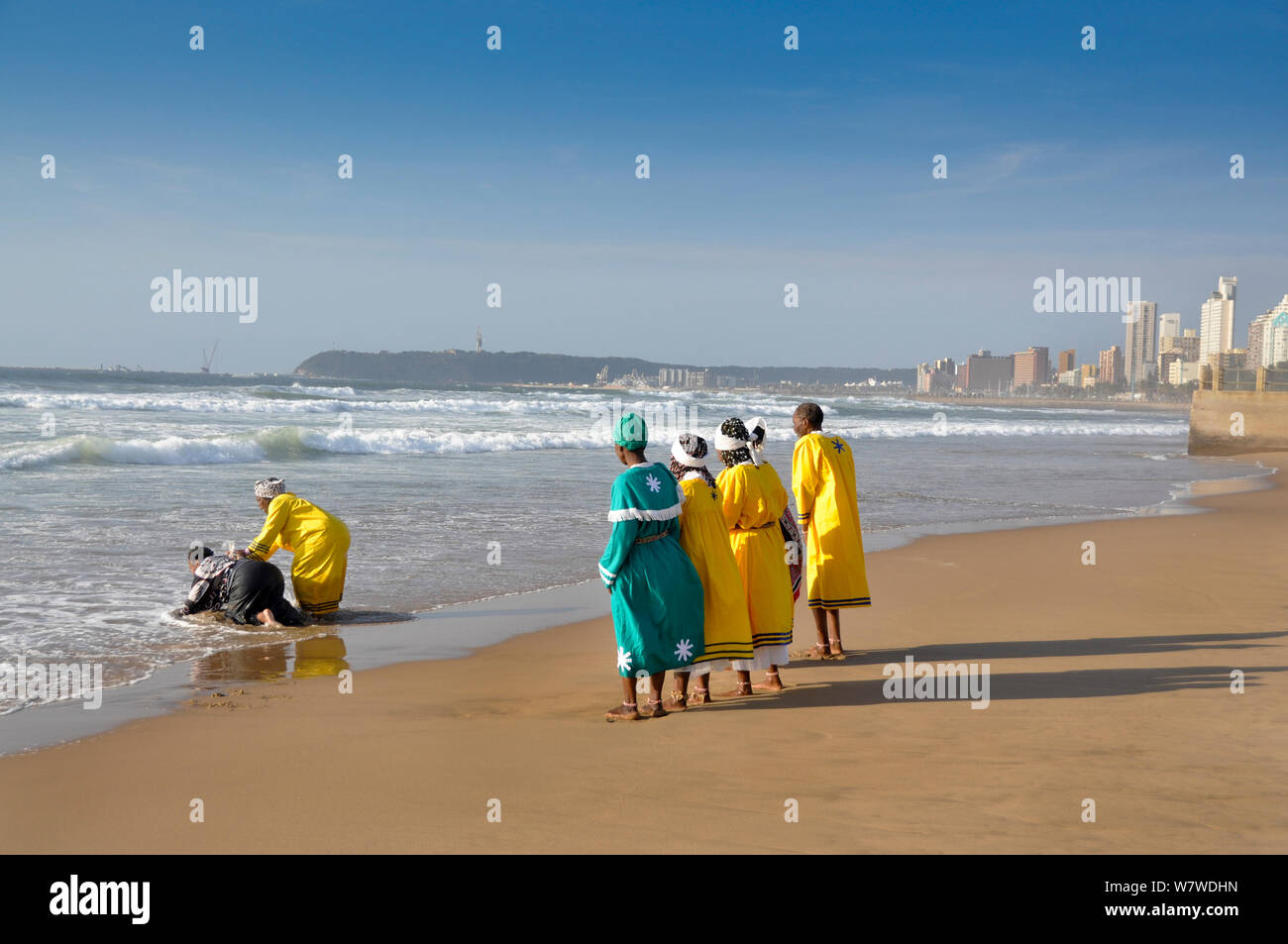 Traditional healers performing a baptism on Durban beach, KwaZuluNatal