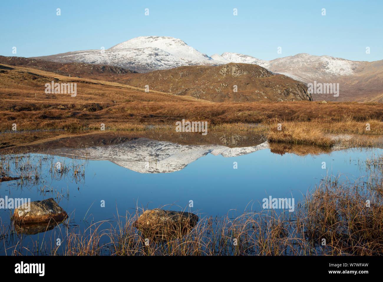 North Harris hills and peaty lochan in late winter, Western Isles, Scotland, April 2013. Stock Photo