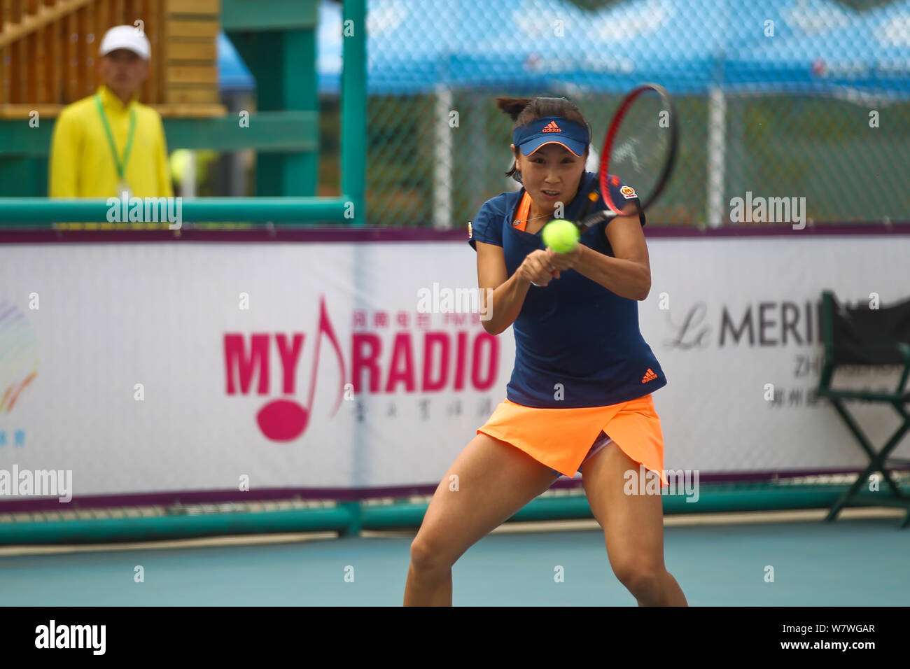 Peng Shuai of China returns a shot to Riko Sawayanagi of Japan in their  second round match during the 2017 Zhengzhou Women's Tennis Open in  Zhengzhou Stock Photo - Alamy