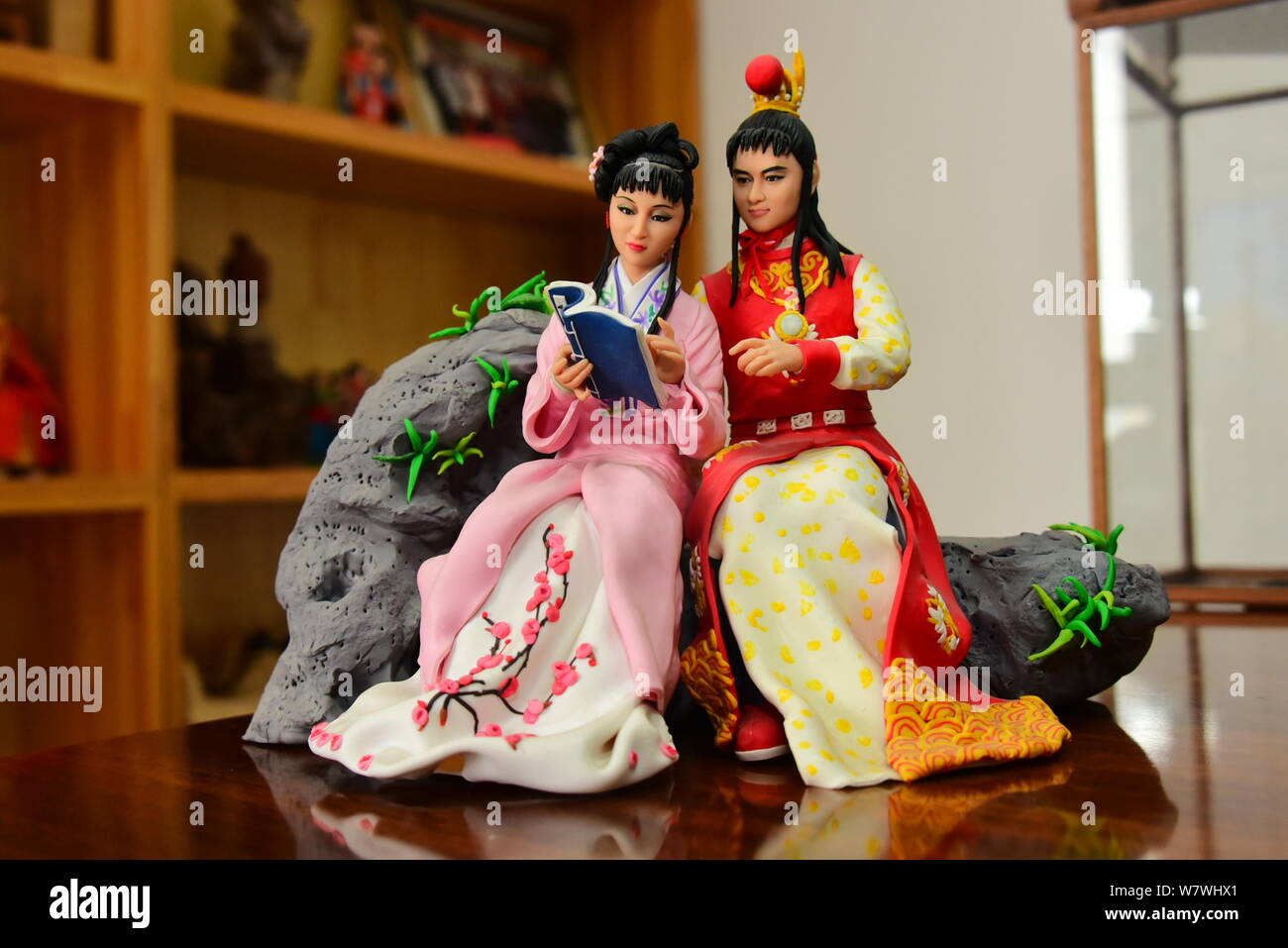 Clay figures of lin daiyu left and jia baoyu the principal