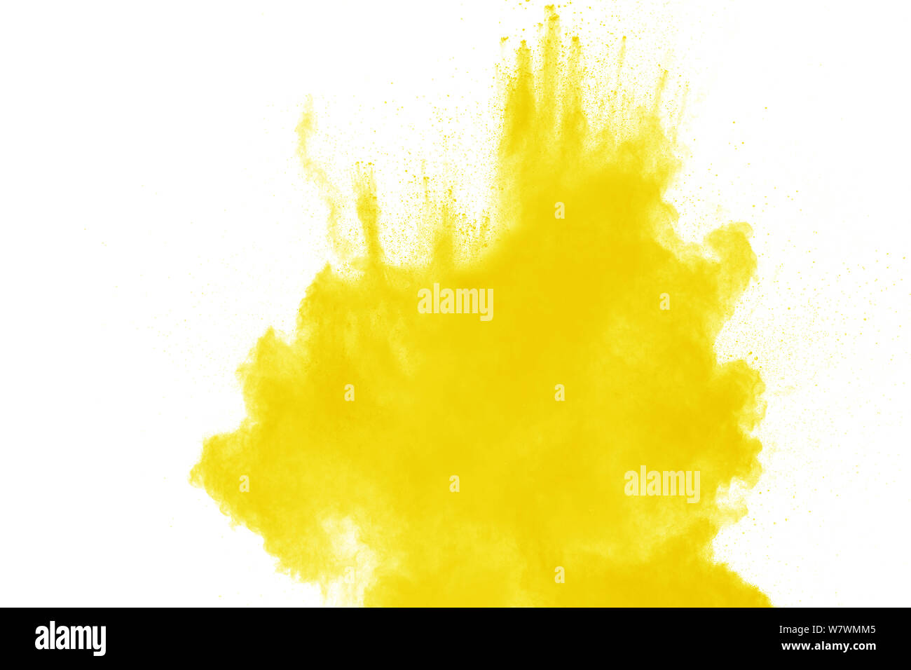 Yellow dust particles explosion on white background. Yellow powder dust splash Stock Photo Alamy