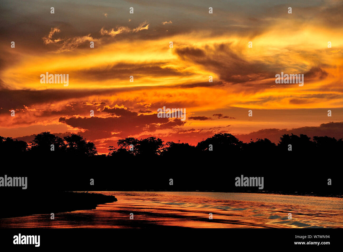 Sunset over in Cuiaba River, Pantanal of Mato Grosso, Mato Grosso State, Western Brazil. Stock Photo