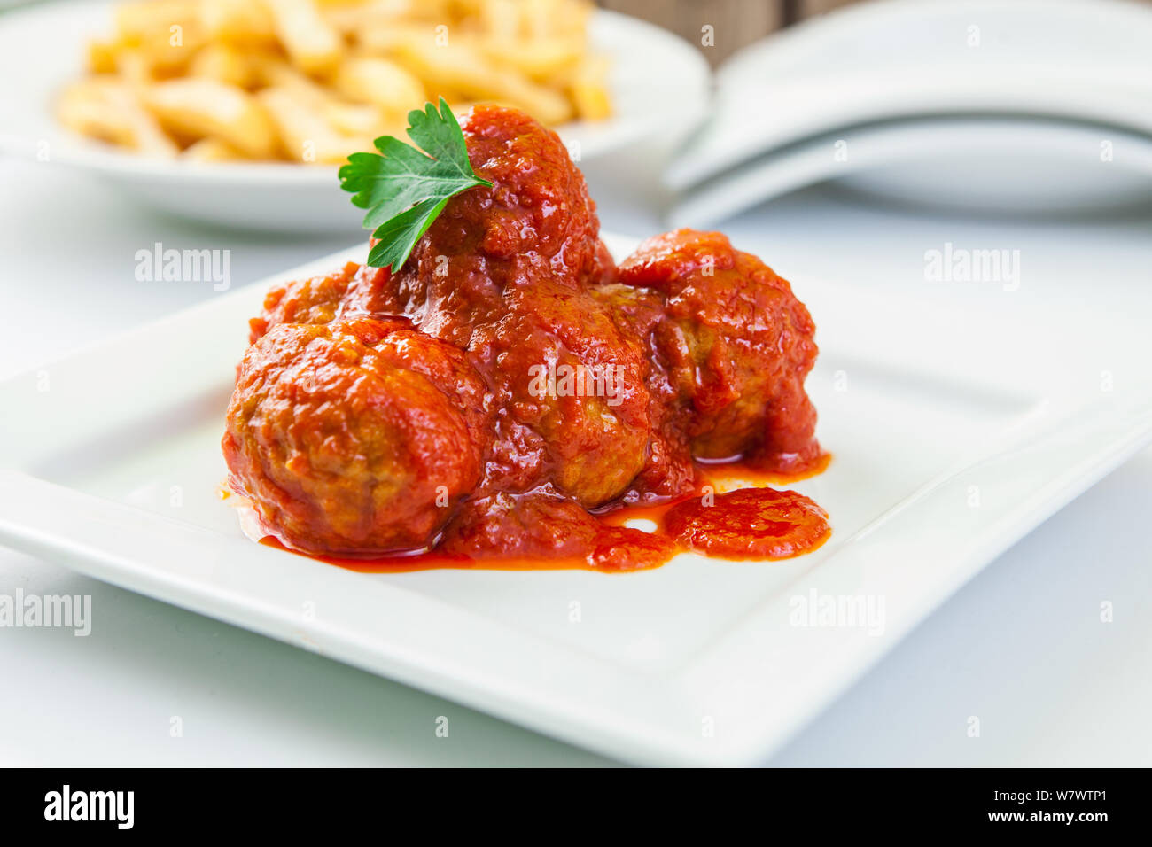 homemade tomato sauce meatballs with french fries Stock Photo Alamy