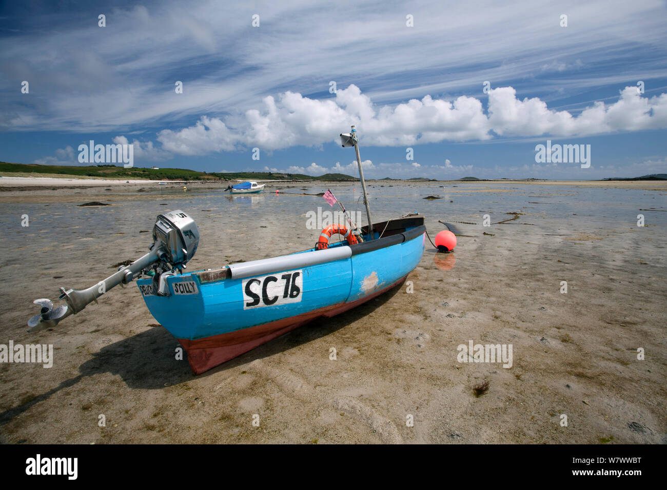 Small motor boat on the beach at St Martin&#39;s, The Isles of Scilly Stock Photo