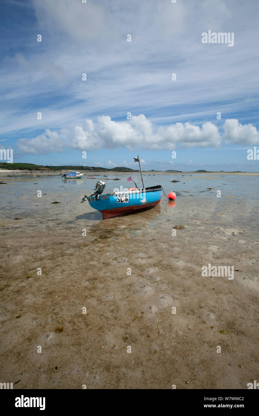 Small motor boat on the beach at St Martin&#39;s, The Isles of Scilly Stock Photo