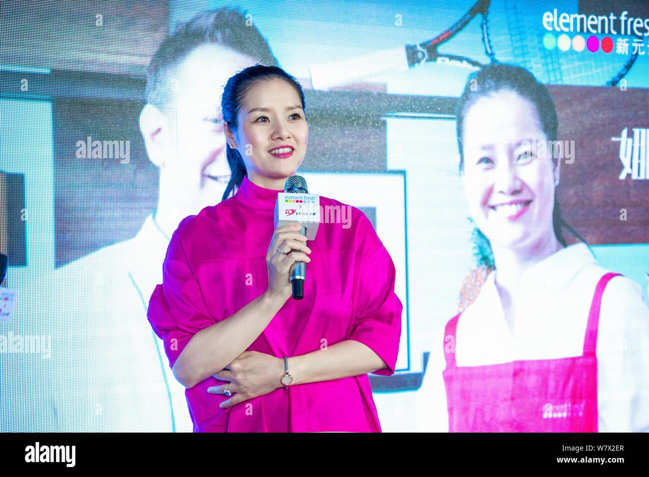 Retired Chinese tennis star Li Na attends the opening ceremony of the restaurant co-opened by her and restaurant brand 'Element Fresh' in Wuhan city, Stock Photo