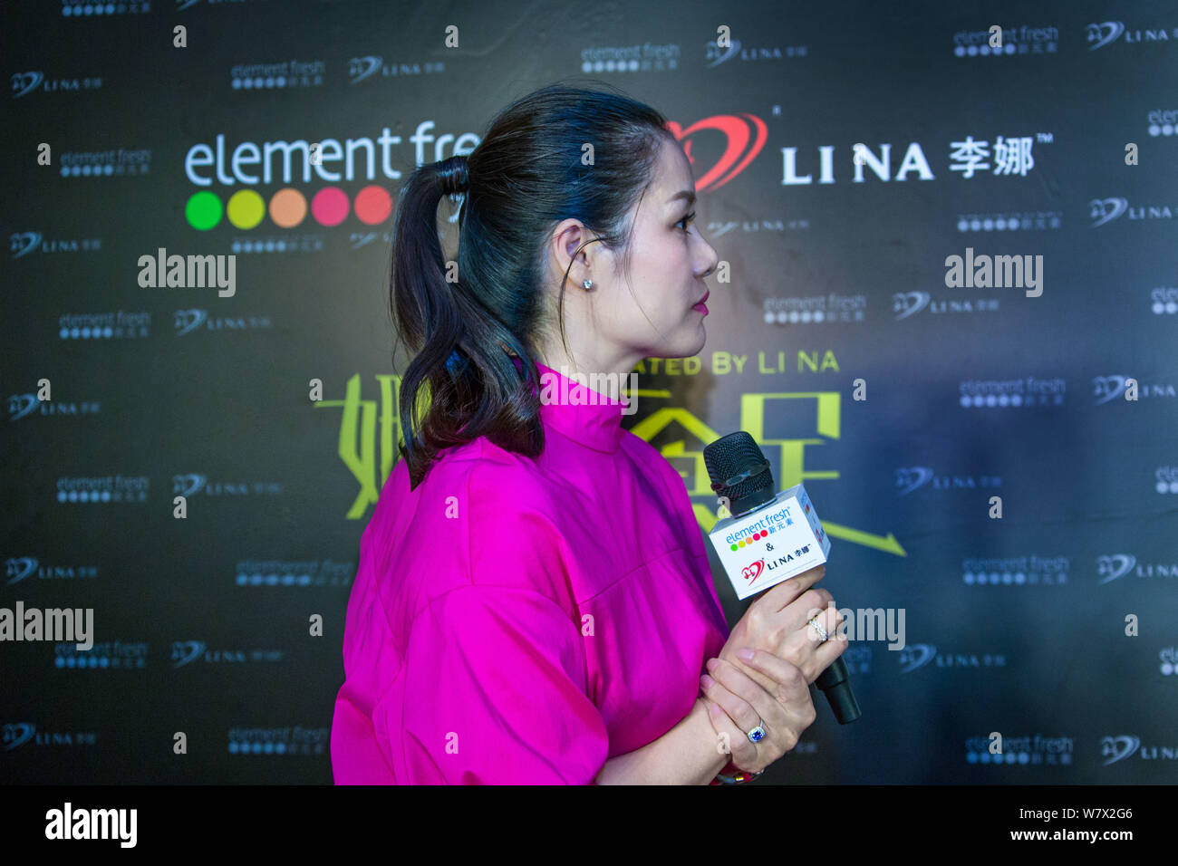Retired Chinese tennis star Li Na attends the opening ceremony of the restaurant co-opened by her and restaurant brand 'Element Fresh' in Wuhan city, Stock Photo