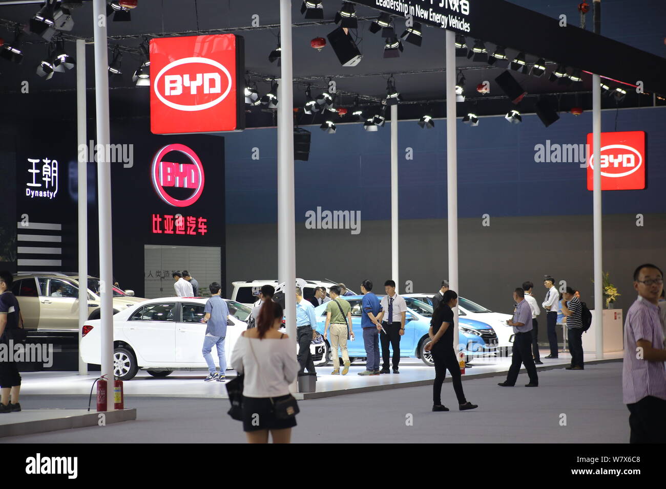 --FILE--Chinese visitors are seen at the stand of BYD during an automobile exhibition in Shanghai, China, 18 November 2016.   Chinese vehicle manufact Stock Photo