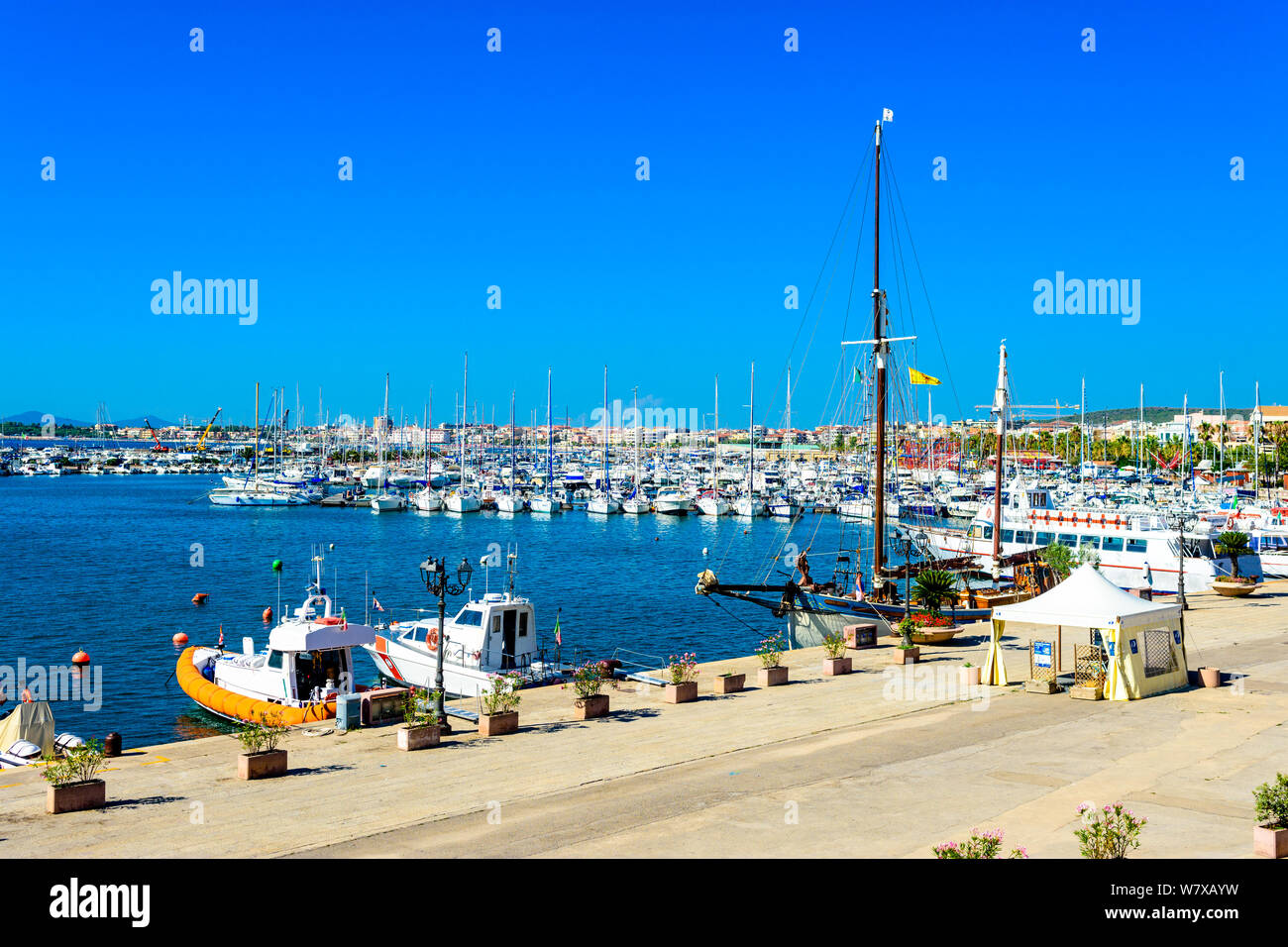 Port, marina with yachts, boats, sailboats  in Alghero, Sardegna, Italy Stock Photo