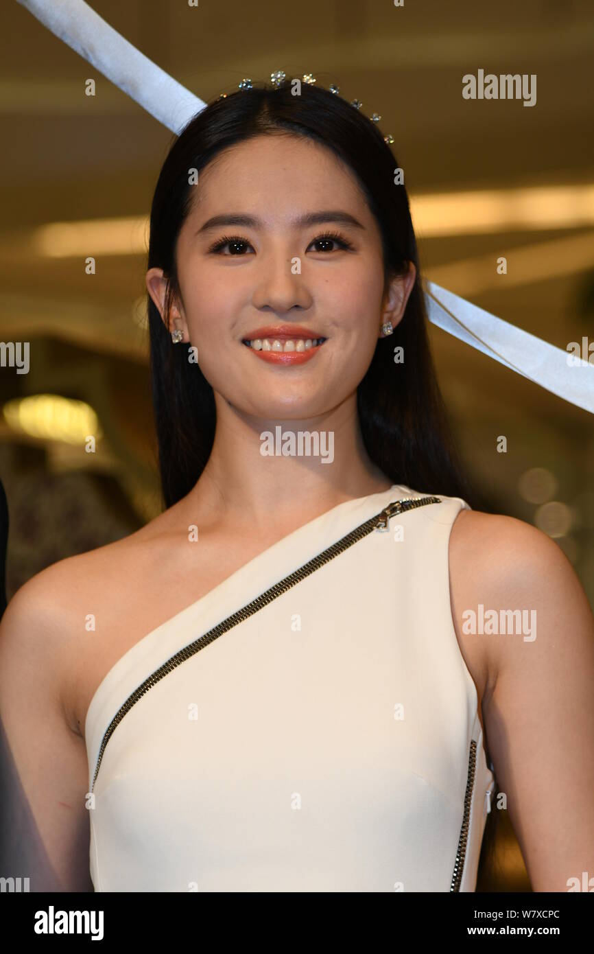 Chinese actress Liu Yifei poses during a promotional event for Bulgari in Shanghai, China, 12 April 2017. Stock Photo