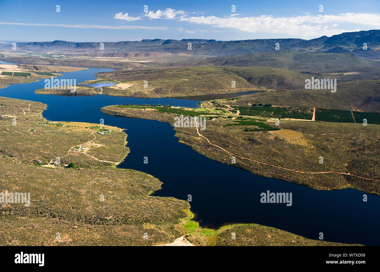 Aerial photograph of the Olifants River and the intensive agriculture along its course, a threat to the endemic fish species found here. Citrusdal and Clanwilliam area, Western Cape, South Africa. December 2013. Stock Photo