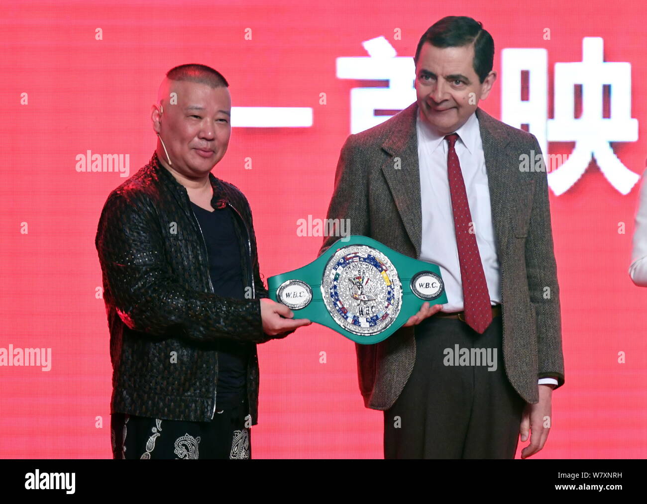 English actor Rowan Atkinson playing Mr. Bean, right, and Chinese comedian Guo Degang attend a premiere for their movie English actor Rowan Atkinson playing Mr. Bean, right, and Chinese comedian Guo Degang attend a premiere for their movie