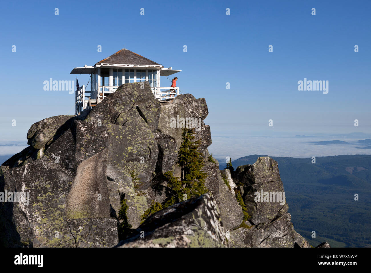 Lookout point on top of Mount Pilchuck, Mount Pilchuck State Park, Cascade Mountains, Washington, USA, July 2014. Model released. Stock Photo