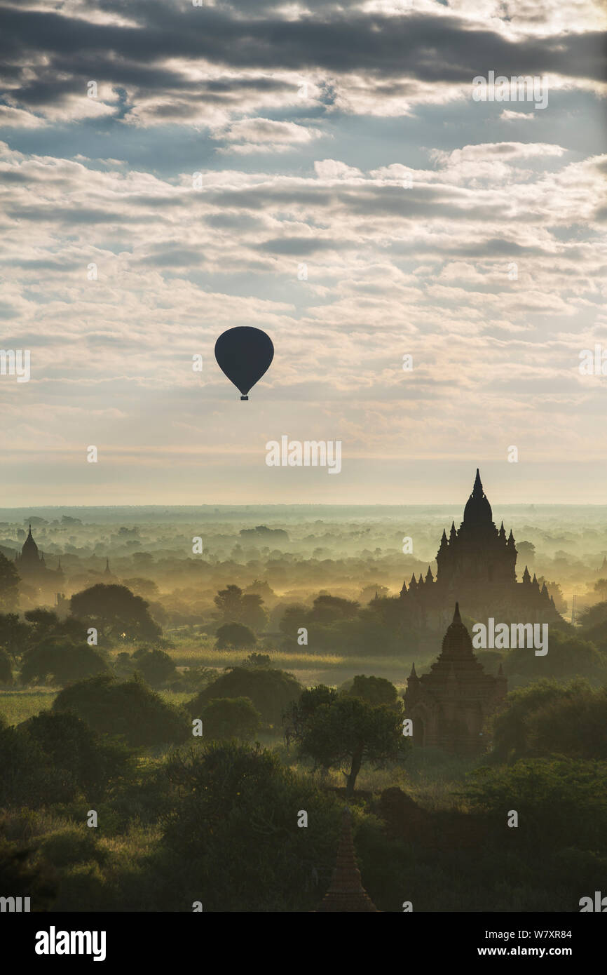 Hot air balloon over the Temples of Bagan at dawn, Myanmar, November 2012. Stock Photo