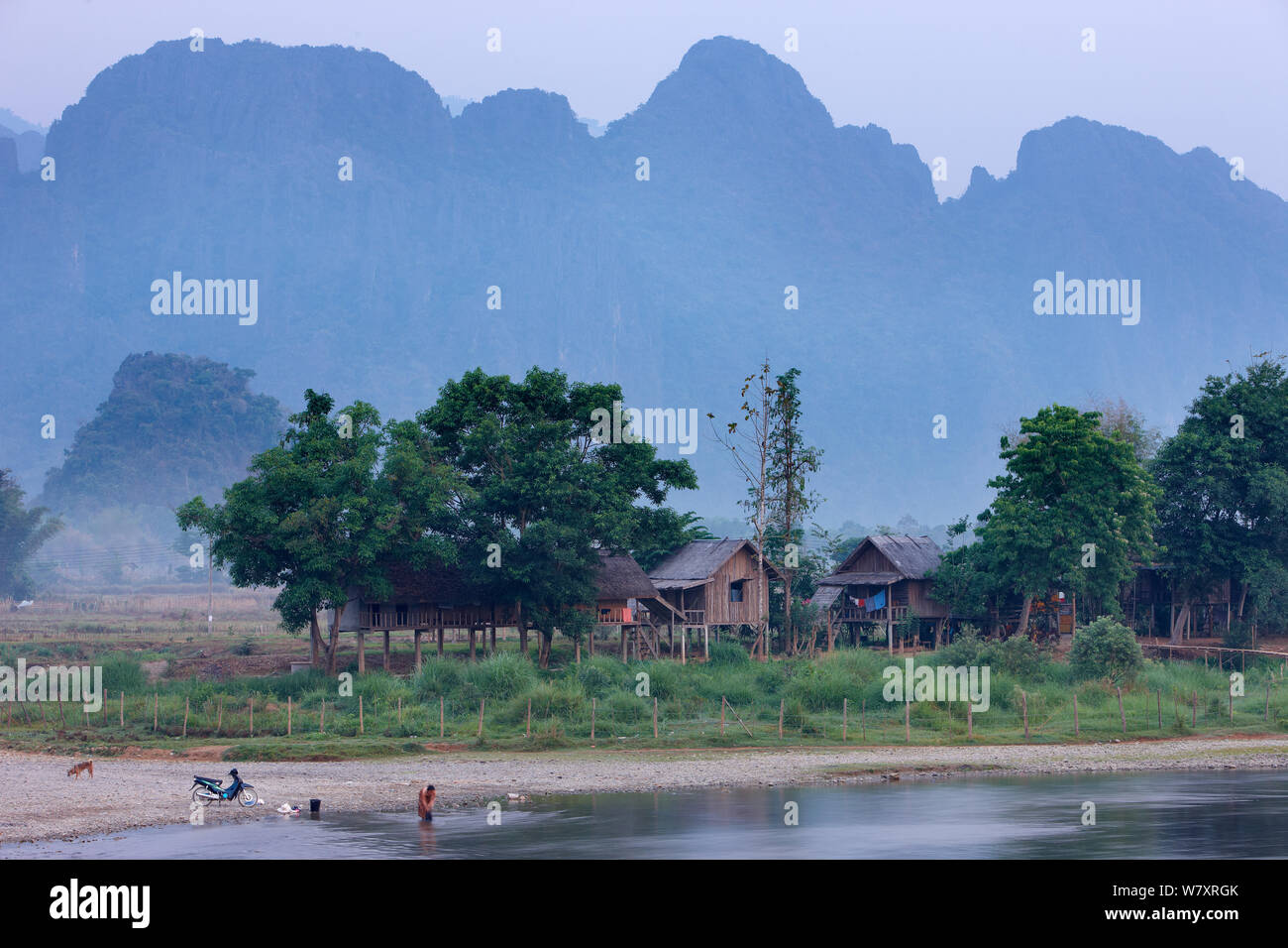 Huts on the shore of the Nam Song River, Vang Vieng, Laos, March 2009. Stock Photo