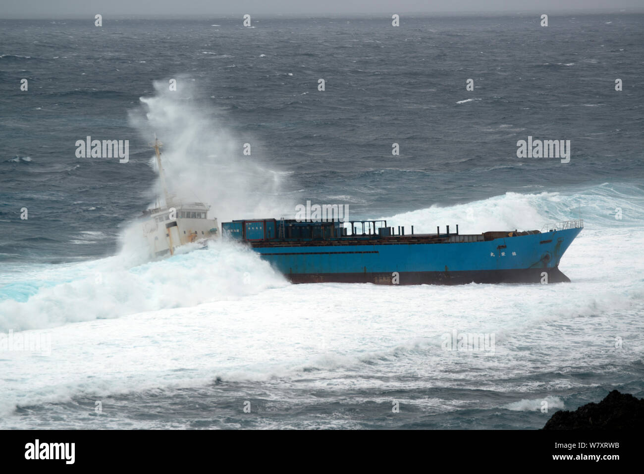 Inter Island container ship, aground and wrecked, Yonaguni Island, East China Sea, Japan. February 2014. Stock Photo