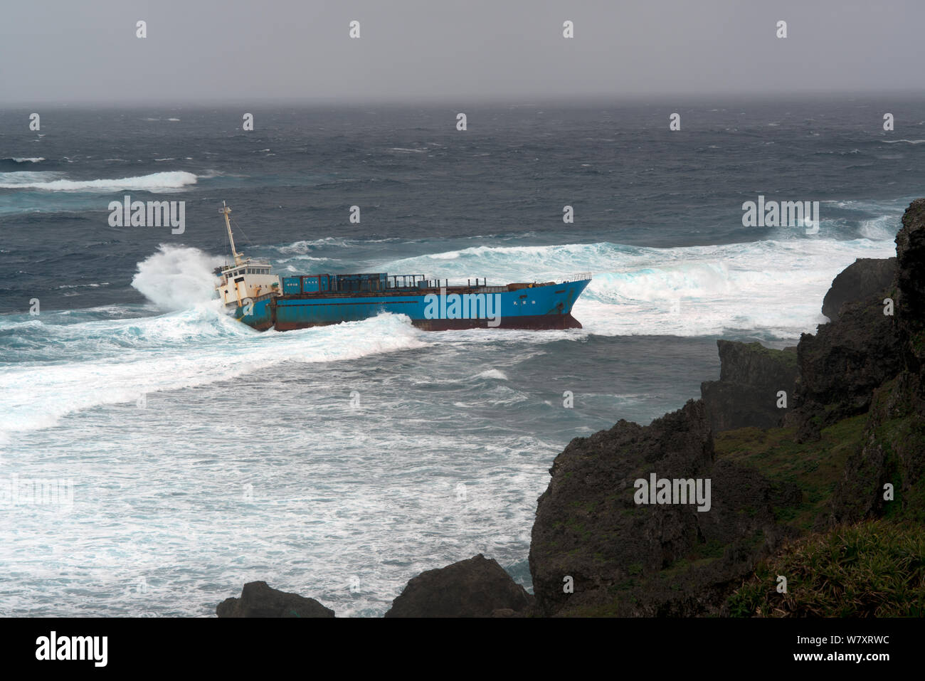 Inter Island container ship, aground and wrecked, Yonaguni Island, East China Sea, Japan. February 2014. Stock Photo