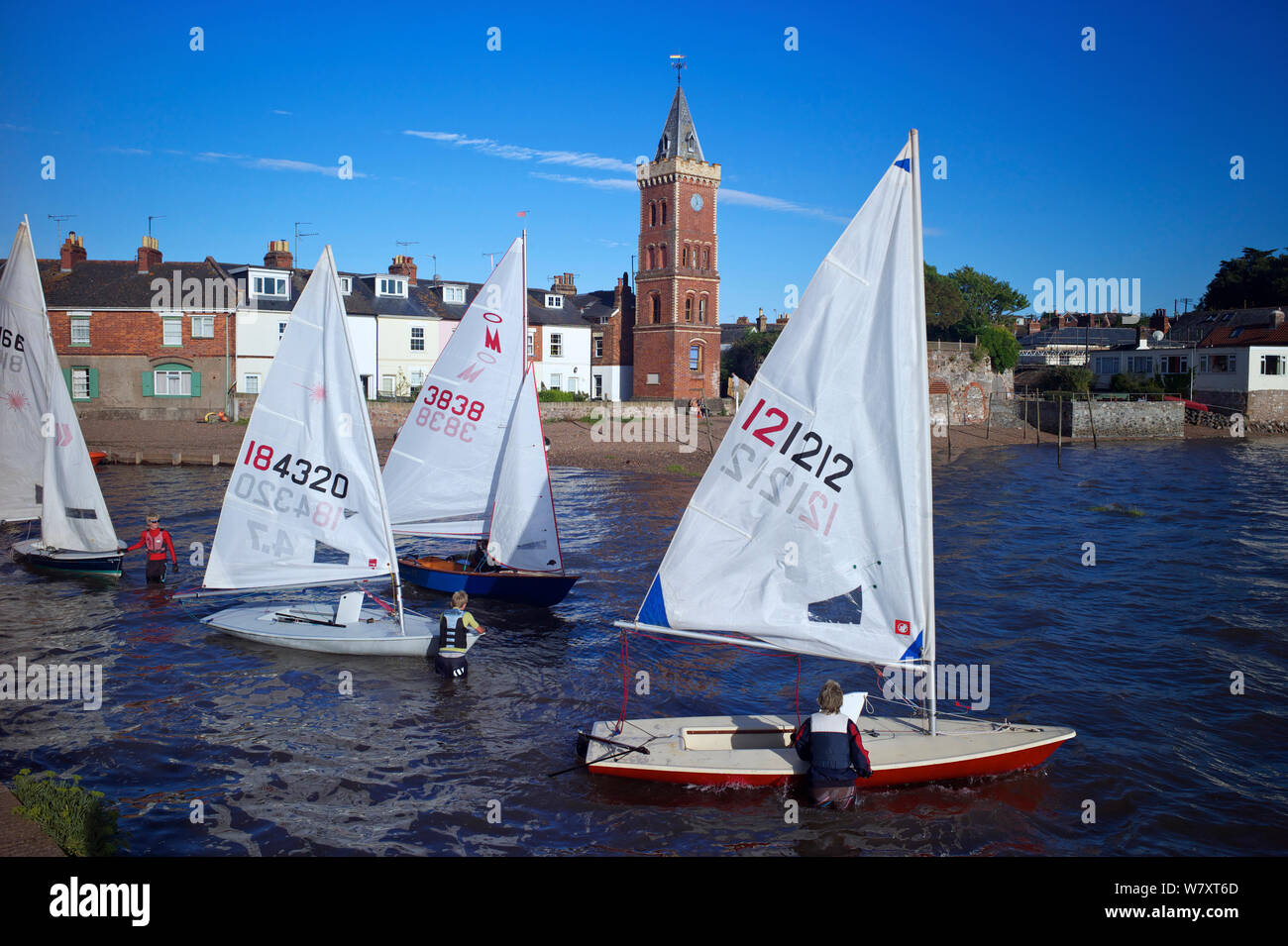 Sailing dinghies launching, Lympstone harbour, Exe Estuary, Devon, UK
