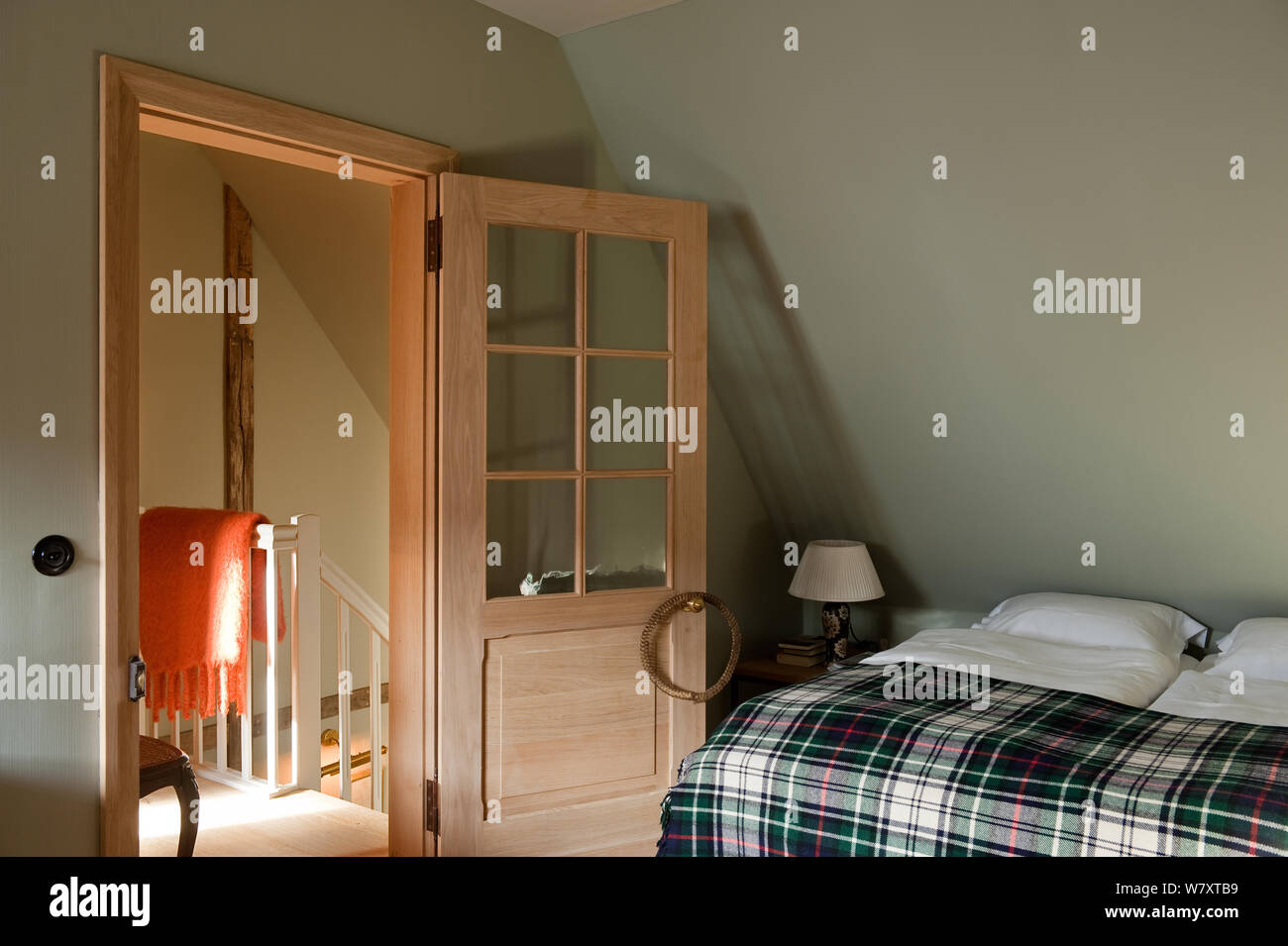 Open door of country style bedroom Stock Photo - Alamy