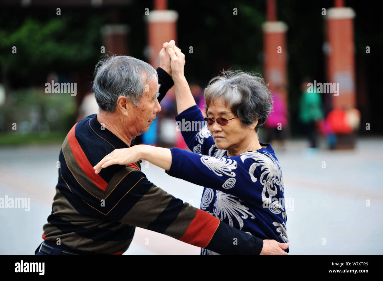 --FILE--Elderly Chinese residents dance at a park in Qingdao city, east ...