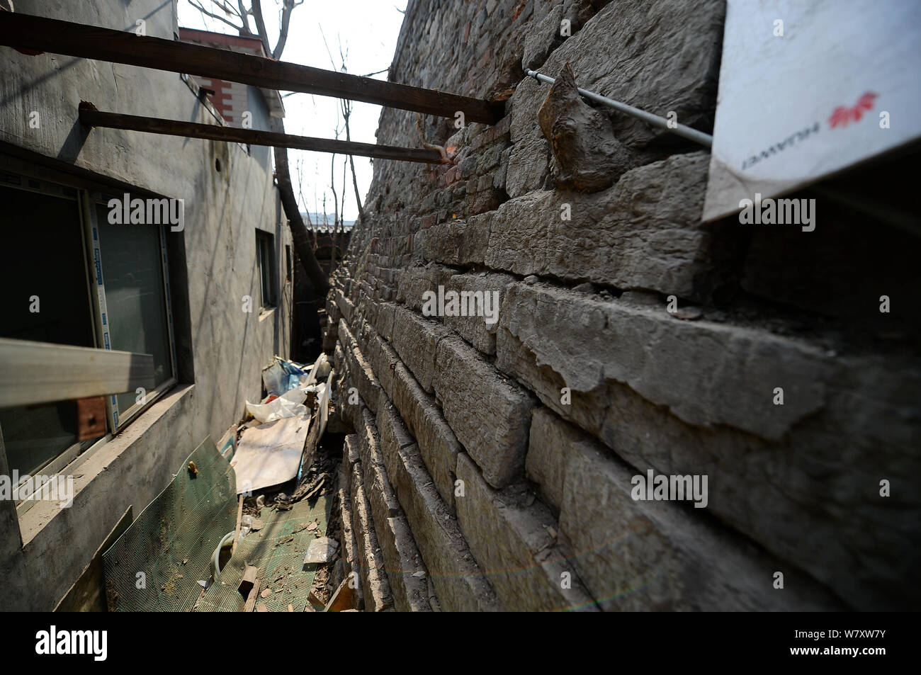 View of the remains of an old city wall dating back to the Ming Dynasty (1368-1644) reappearing after unauthorized buildings in front of it were destr Stock Photo