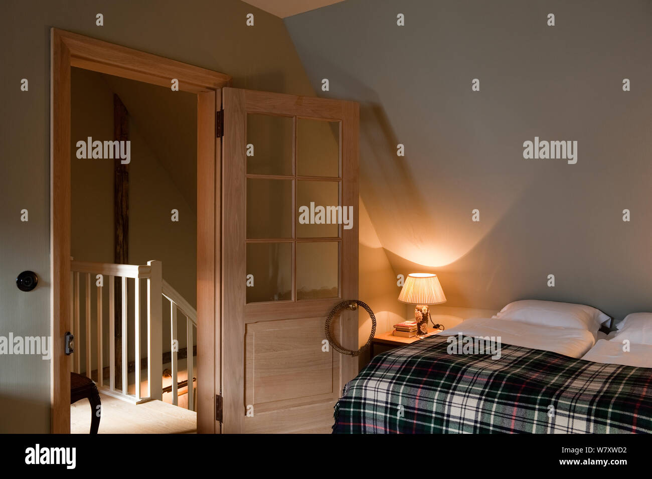 Open door of country style bedroom Stock Photo - Alamy