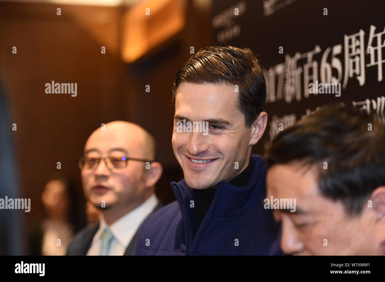 English violinist Charlie Siem poses during a concert at a shopping